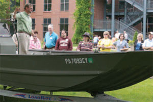 Guests listen to Eric Chapman, WPC’s director of aquatic science,
at the Local Water Summit at WPC’s Pittsburgh office on
Washington’s Landing.