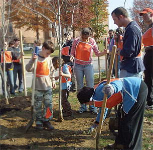 TreeVitalize volunteers help at an
East Liberty planting.