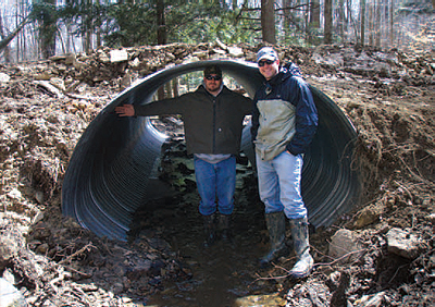 WPC’s Tye Desiderio, watershed program GIS specialist (left) and Brian Neal, watershed program
projects manager, helped install culverts this year that allow the streams to flow more naturally.