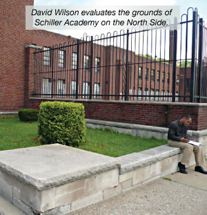 WPC worker surveying the school grounds