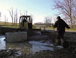 WPC staff members help install an alternative watering source
for livestock on a dairy farm in Indiana, Pa.